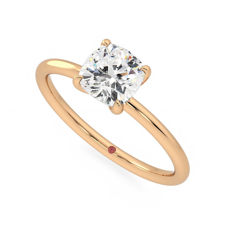 Demure rose gold cushion solitaire engagement ring